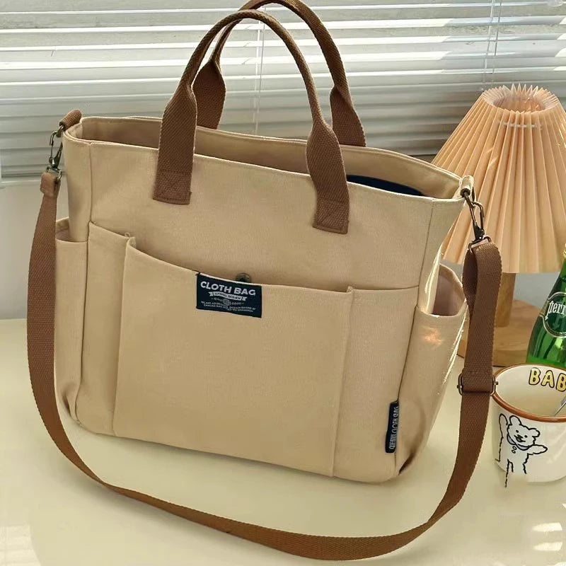 Bolsa tote portátil urbana minimalista, grande capacidade, para estudantes, de lona horizontal, com um ombro, diagonal e transversal