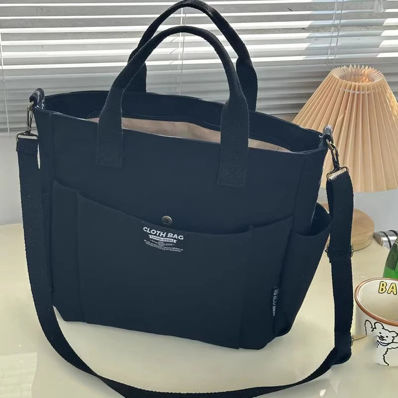 Bolsa tote portátil urbana minimalista, grande capacidade, para estudantes, de lona horizontal, com um ombro, diagonal e transversal