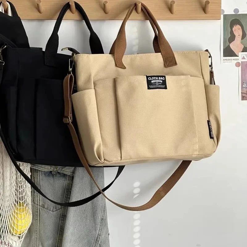 Bolsa tote portátil urbana minimalista, grande capacidade, para estudantes, de lona horizontal, com um ombro, diagonal e transversal