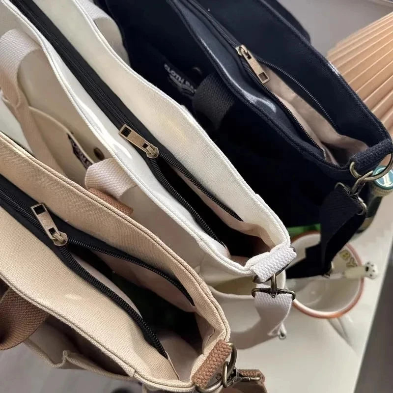 Bolsa tote portátil urbana minimalista, grande capacidade, para estudantes, de lona horizontal, com um ombro, diagonal e transversal